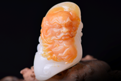 玉雕师如何处理玉雕人物的手和脸
