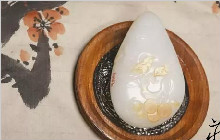 和田玉手把件，把握掌中的雅趣